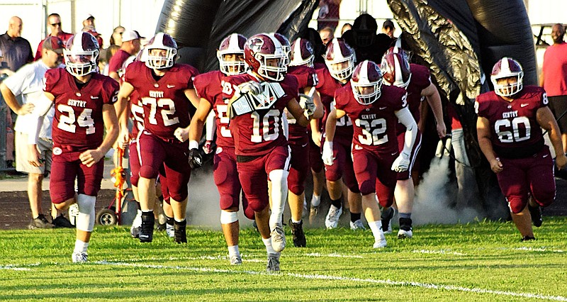 Westside Eagle Observer file photo/RANDY MOLL
The Pioneer varsity football field enters the field in a Gentry home game earlier in the season.