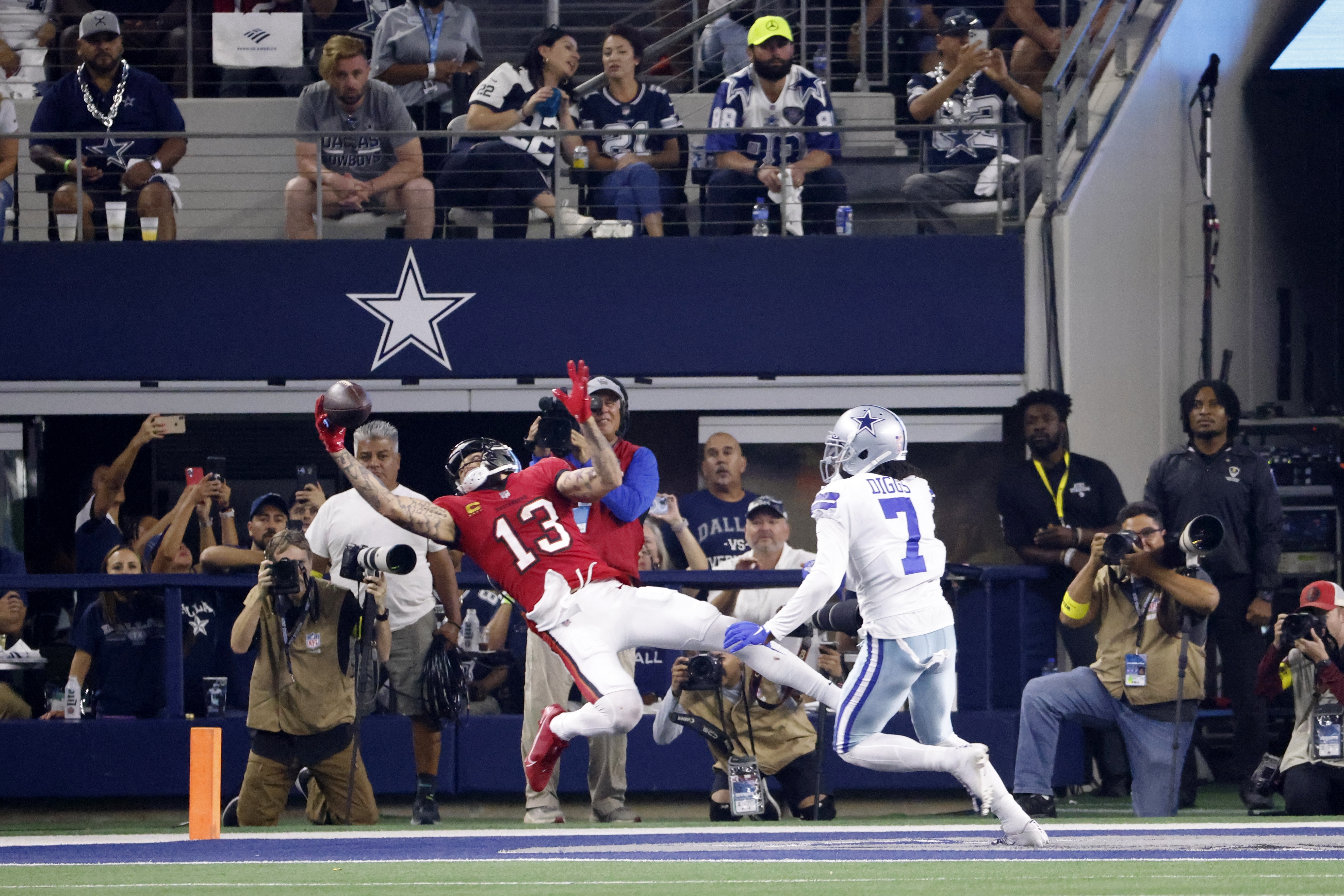 Dallas Cowboys cornerback Anthony Brown (3) defends as Tampa Bay Buccaneers  wide receiver Mike Evans (13) catches a pass in the second half of a NFL  football game in Arlington, Texas, Sunday