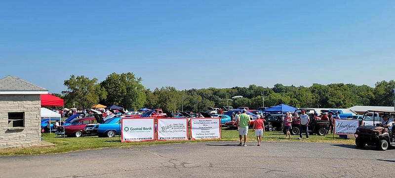 Attendees walk into the 2021 Ozark Ham and Turkey Festival Car Show for a day of fun. Car show chairman Tyler Clenin said he looks to improve and add on to the event to ensure guests continue to have more to enjoy. (Submitted photo)