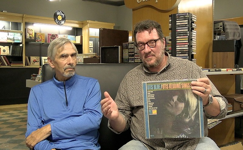 Tom Coleman, left, and Mark Maybrey describe their passion for vinyl records.  - Photo by Andrew Mobley of The Sentinel-Record