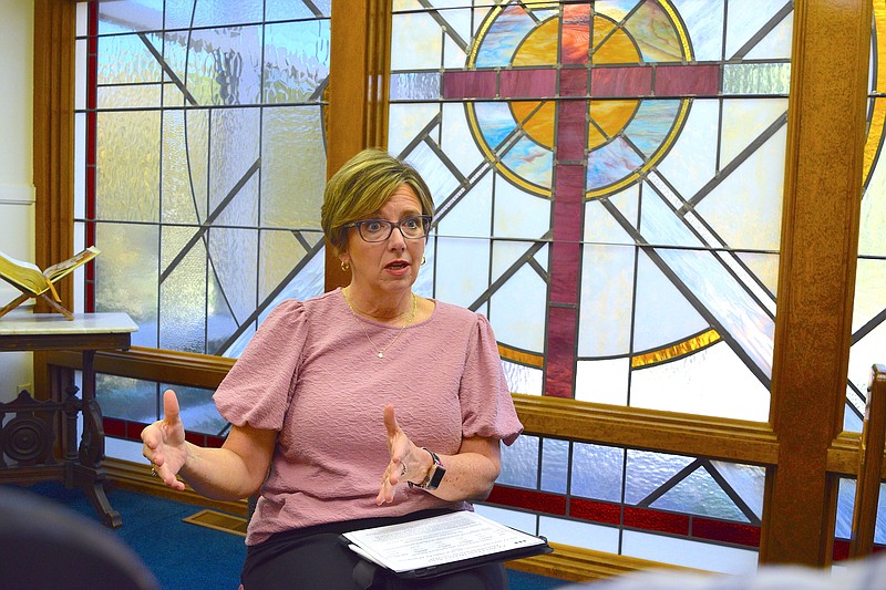 Cooperative Christian Ministries and Clinic Executive Director Kim Carter, shown in the facility’s chapel, says there is a housing crisis in Hot Springs and Garland County. - Photo by Donald Cross of The Sentinel-Record