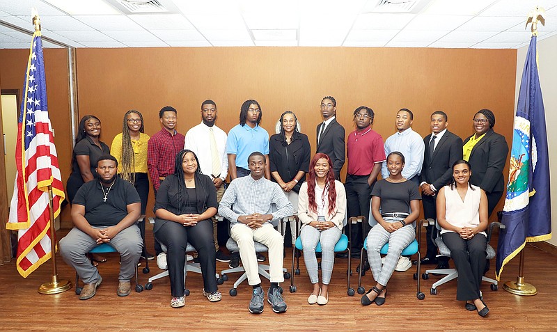 Sixteen students at the University of Arkansas at Pine Bluff are earning their degrees tuition-free through the U.S. Department of Agriculture/1890 National Scholars Program. Participants include, first row, Jaylon Robinson (left) Messhriya Harris, Justin Webb, Charlese Colen, Justice Walton and Jacqueline Price; second row, Hezekiah Kirkwood (left) Jameka Harston, Courtney Miller Jr., Collin Branch, Jordan Robinson, USDA liaison Belinda Demmings, James Quincy Robinson, Erikton Goodloe, Tyler Garlington, Joshua Holloway and Hallie Roby. (Special to The Commercial/University of Arkansas at Pine Bluff)