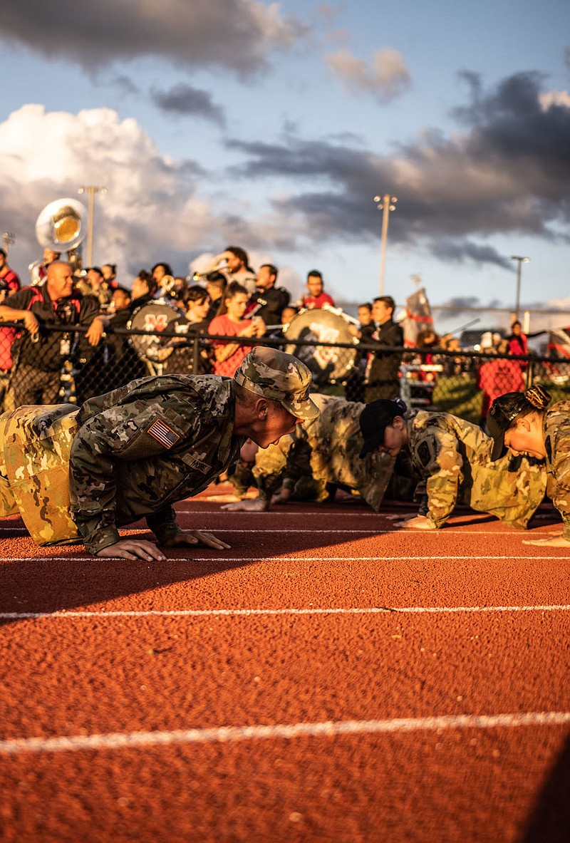 PHOTO SUBMITTED BY GRIFFIN SCHUTTEN
JROTC students participating in the pushup platoon at a home football game. Students are invited to participate in every home game, instilling a further sense of community amongst students.