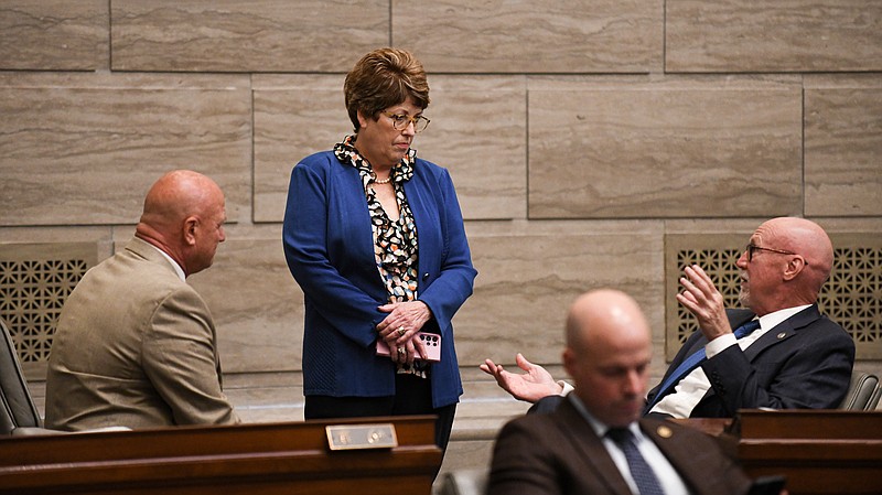 Missouri state senators Mike Bernskoetter, R-Jefferson City, left, Cindy O'Laughlin, R-Shelbina and Mike Cierpoit, R-Lees Summit, talk during the day's opening special session Wednesday, Sept. 14, 2022. (Julie Smith/News Tribune photo)