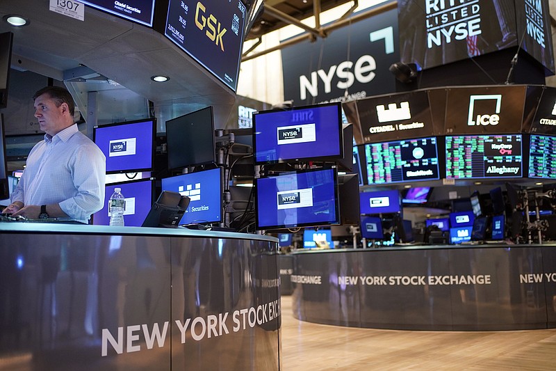 FILE - Traders work on the floor at the New York Stock Exchange in New York, Aug. 10, 2022. (AP/Seth Wenig, File)