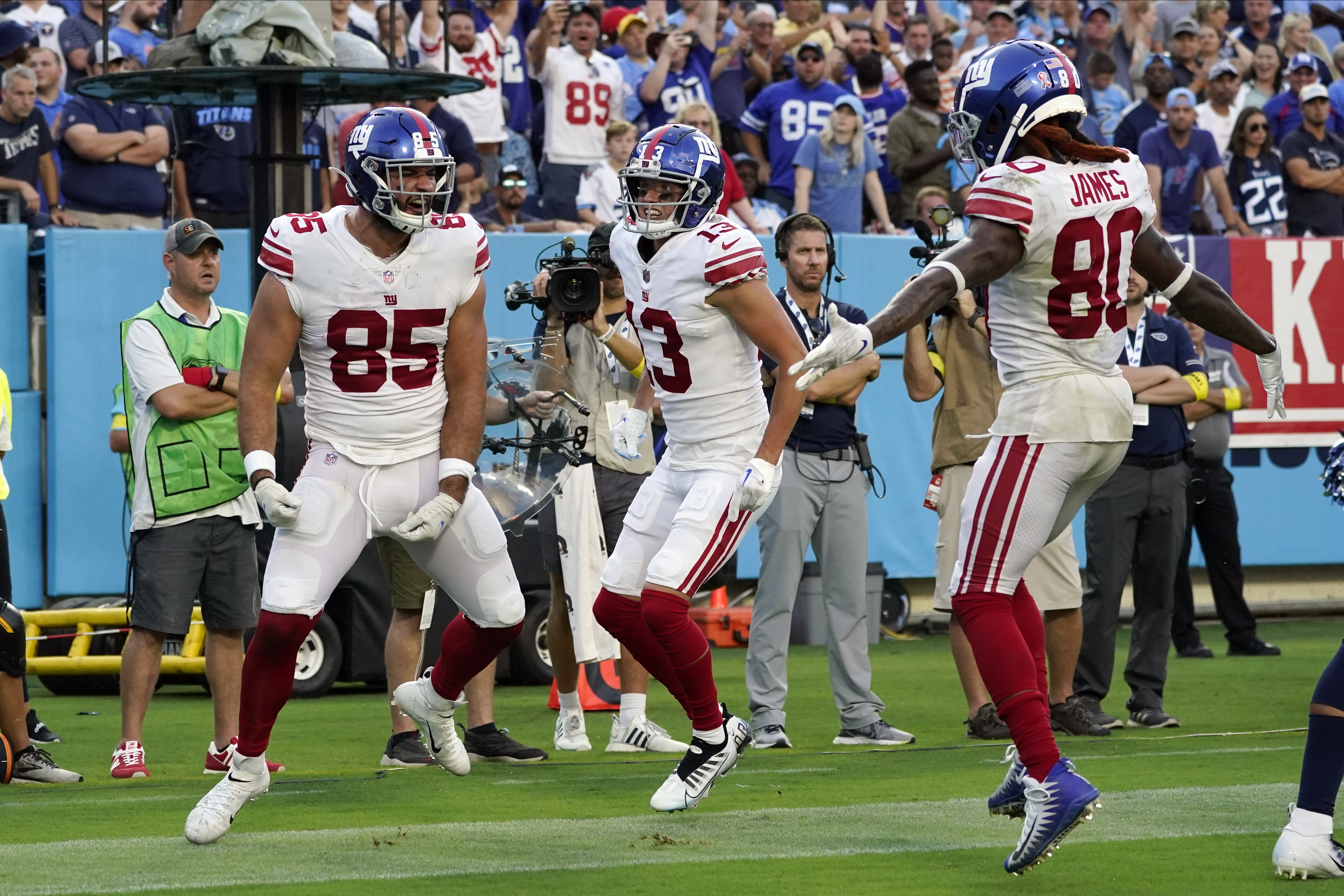 New York Giants running back Saquon Barkley (26) celebrates after making a  touchdown run against the Tennessee Titans during the second half of an NFL  football game Sunday, Sept. 11, 2022, in