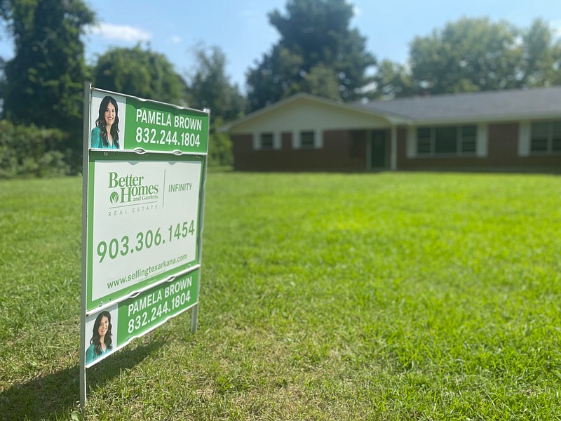 A house listed for sale is pictured on Thursday, Sept. 15, 2022, on Moores Lane in Texarkana, Texas. (Staff photo by Andrew Bell)