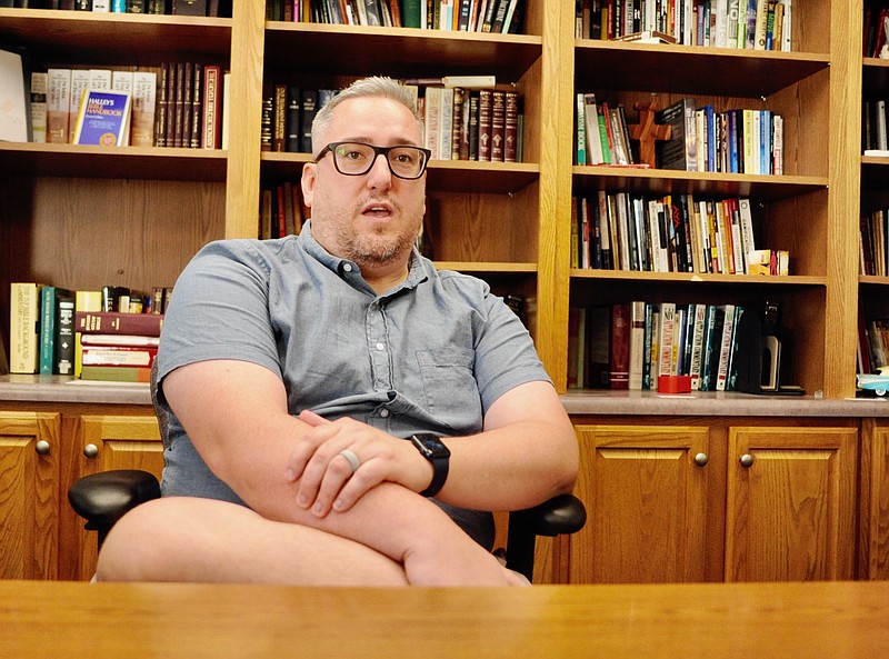 In this September 2022 photo, Capital West Christian Church Senior Minister Dallas Henry chats about community, Christianity and Cubs. (Joe Gamm/News Tribune photo)