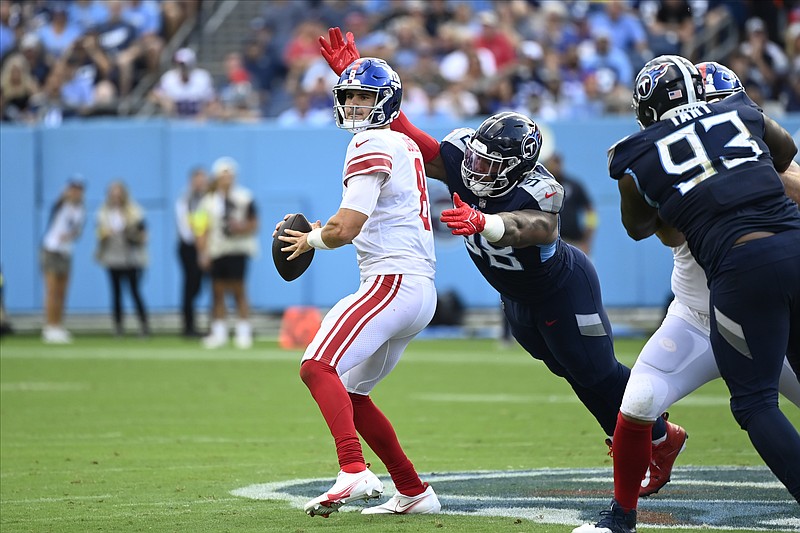 Tennessee Titans defensive tackle Jeffery Simmons (98) forces New York Giants quarterback Daniel Jones (8) to fumble Sept. 11 in Nashville. - Photo by Mark Zaleski of The Associated Press