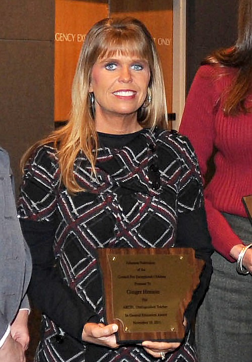 Ginger Henson is shown with an award she received at the Council for Exceptional Children Conference at the Hot Springs Convention Center on Nov. 10, 2011. - File photo by The Sentinel-Record