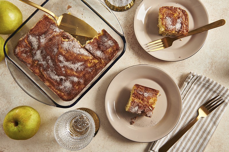 This November 2020 photo shows a recipe for apple cake. Apples at Rosh Hashana symbolize abundance and hope for the new year. (Cheyenne Cohen via AP)