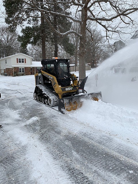 The city rented this loader in February 2021 to keep White Hall's roads passable. On Monday, the White Hall City Council approved the purchase of a new tracked skid steer loader that Mayor Noel Foster estimated will cost about $80,000. (Special to The Commercial)