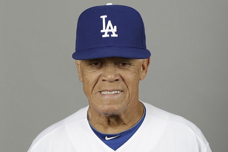 FILE - This is a 2013 photo of Los Angeles Dodgers' Maury Wills. Maury Wills, who helped the Los Angeles Dodgers win three World Series titles with his base-stealing prowess, has died. The team says Wills died Monday night, Sept. 19, 2022, in Sedona, Ariz. He was 89. (AP Photo/Paul Sancya, File)