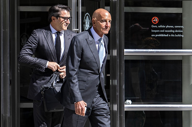 Tom Barrack, right, exits Brooklyn Federal Court on Tuesday, Sept. 20, 2022, in New York. Potential jurors in the criminal trial of Donald Trump's inaugural committee chair Tom Barrack have been quizzed by the judge on a tricky topic: What do they think of the former president? (AP Photo/Brittainy Newman)