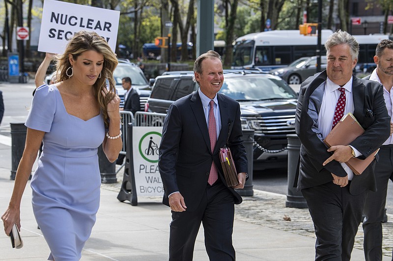 Former President Donald Trump's attorneys Linsey Halligan, James Trusty, and Chris Kise arrive at Brooklyn Federal Court on Tuesday, Sept. 20, 2022, in New York. Lawyers for Trump and for the Justice Department are to appear in federal court in Brooklyn on Tuesday before a veteran judge named last week as special master to review the roughly 11,000 documents — including about 100 marked as classified — taken during the FBI's Aug. 8 search of Mar-a-Lago.  (AP Photo/Brittainy Newman)