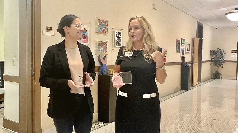 Hot Springs World Class High School counselor Amy Snider, right, talks about receiving the 2022 Yale Educator Award as fellow recipient Cassie Jay-Barron looks on in the district administrative offices at the historic Jones School building. - Photo by Brandon Smith of The Sentinel-Record