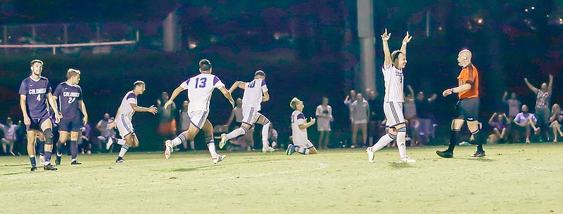 Photo courtesy of JBU Sports Information
John Brown men's soccer players celebrate after scoring a goal Tuesday, Sept. 20 against Columbia (Mo.).