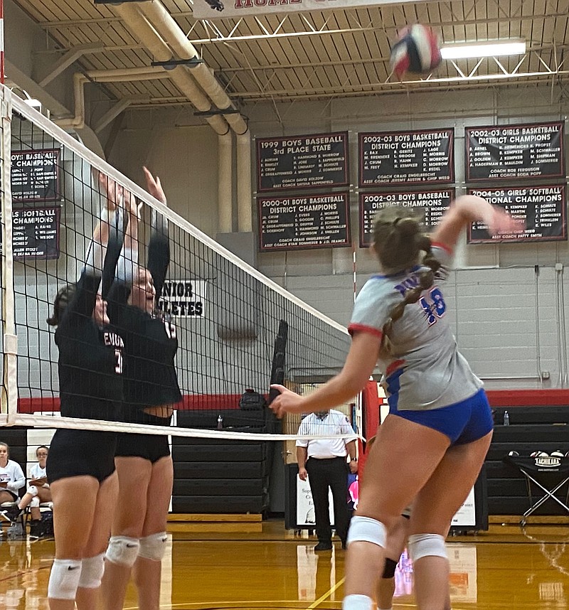 Junior Ella Bailey goes up for one of her three kills against the Eugene Lady Eagles on Thursday night.(Democrat Photo/Evan Holmes)