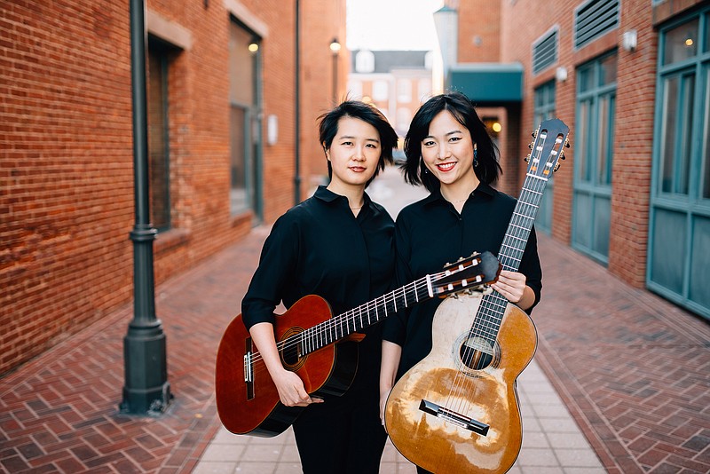 The Beijing Guitar Duo — Meng Su (left) and Yameng Wang — performs today at Arkansas Tech University in Russellville. (Special to the Democrat-Gazette)