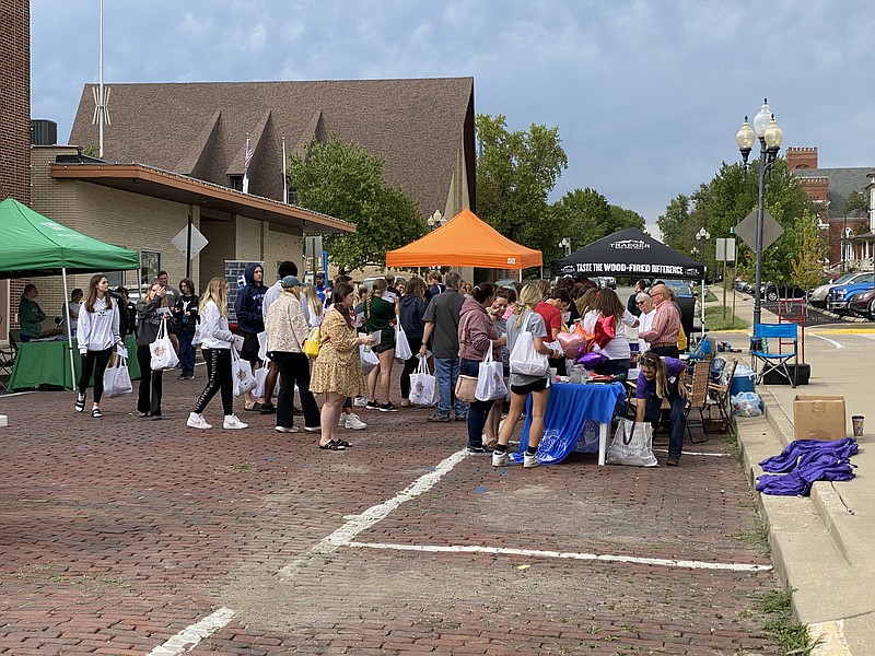 Anakin Bush/Fulton Sun
Students from Westminster College and William Woods University visit booths setup by local businesses for the Brick Blast. A total of 37 businesses participated this year.