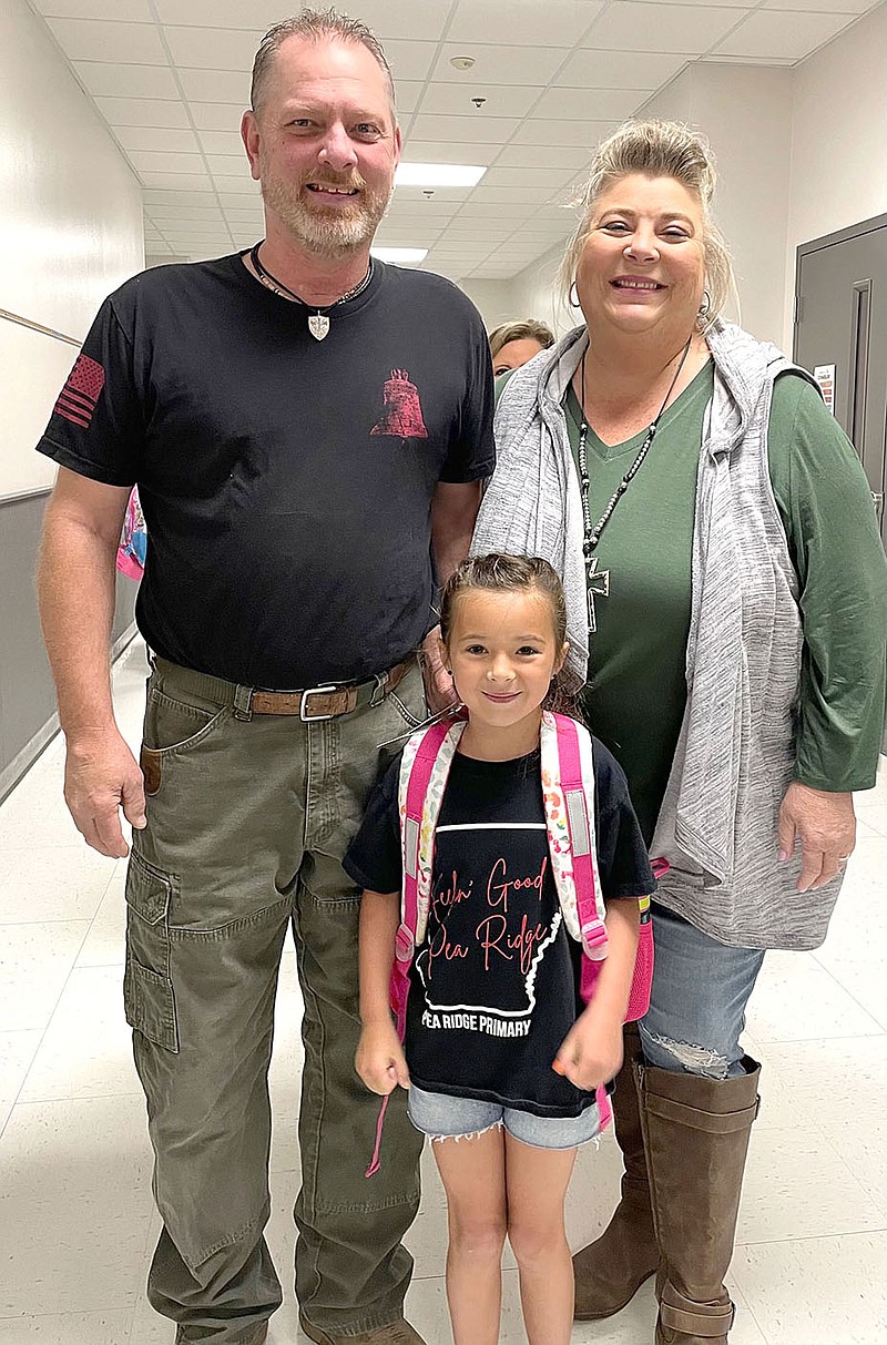 TIMES photographs by Annette Beard
"The Grand Event" at the Pea Ridge Primary School Friday, Sept. 23, celebrated grandparents as they were invited to share breakfast of muffins and fruit with their grandchildren. Dino and Sharon Collins joined their granddaughter, McKenna Collins, 7, Friday morning.