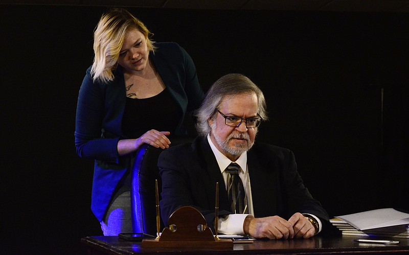 Eileen Wisniowicz/News Tribune photo: 
Jessi Green plays Carol and John Luker plays John during a rehearsal for Oleanna on Tuesday, Sept. 27, 2022, at Scene One in Jefferson City. The two-character drama will run October 6-8 and 13-15.