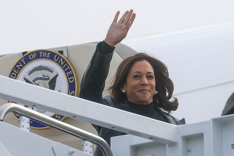 Vice President Kamala Harris boards Air Force 2 for travel to Japan and South Korea on Sunday, Sept. 25, 2022, from Joint Base Andrews, Maryland. (Leah Millis/Pool via AP)