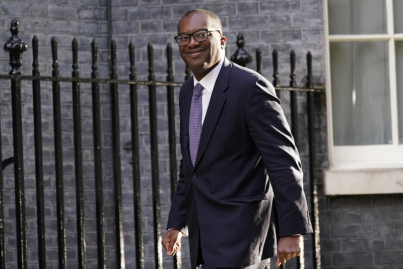 FILE - Britain's Chancellor of the Exchequer Kwasi Kwarteng arrives in Downing Street in London, on Sept. 7, 2022 for the first cabinet meeting since Liz Truss was installed as British Prime Minister a day earlier. Britain’s Conservative government is expected to publish an emergency budget statement Friday, Sept. 23, 2022 outlining how it plans to slash taxes, tame soaring inflation and boost economic growth as a recession looms on the horizon. (AP Photo/Alberto Pezzali, File)