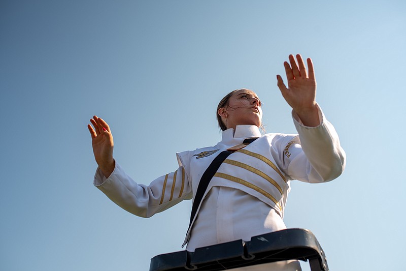 The Pleasant Grove High School drum major conducts the Pride in Motion band's performance during an exhibition ahead of the marching invitational Saturday morning, Sept. 24, 2022, at Hawk Stadium in Texarkana, Texas. It was the fourth year for the Pride in Motion Band to host the competition. (Staff photo by Erin DeBlanc)