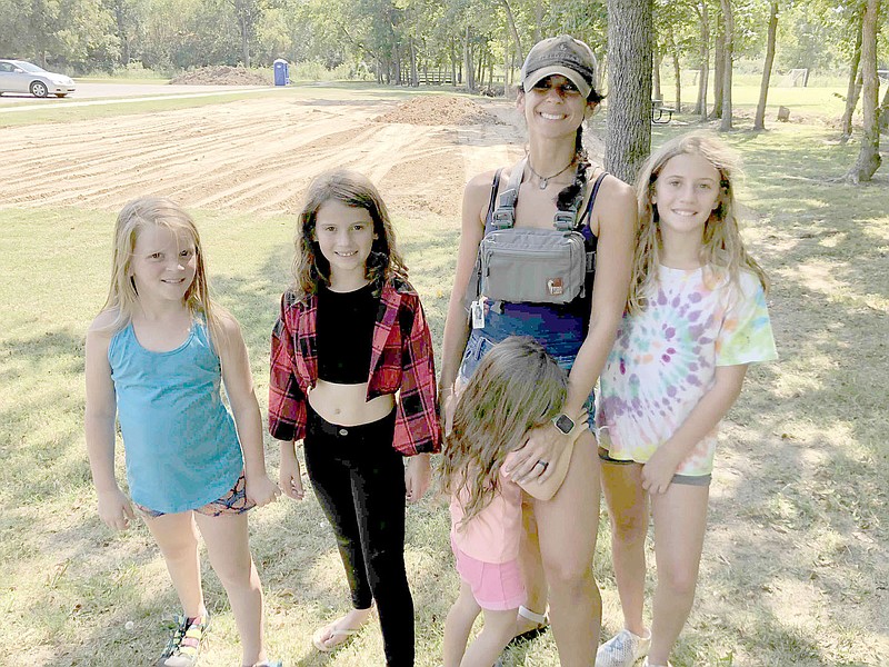 DENISE NEMEC SPECIAL TO ENTERPRISE-LEADER
Samantha E. (she requested that her last name be withheld) enjoys Muddy Fork Park with her children: from left, Lucy, 7, Carley, 10, Reva, 3, and Chloe, 11. The background shows prep work for the park’s upgrades, which will be a new playground and restrooms.