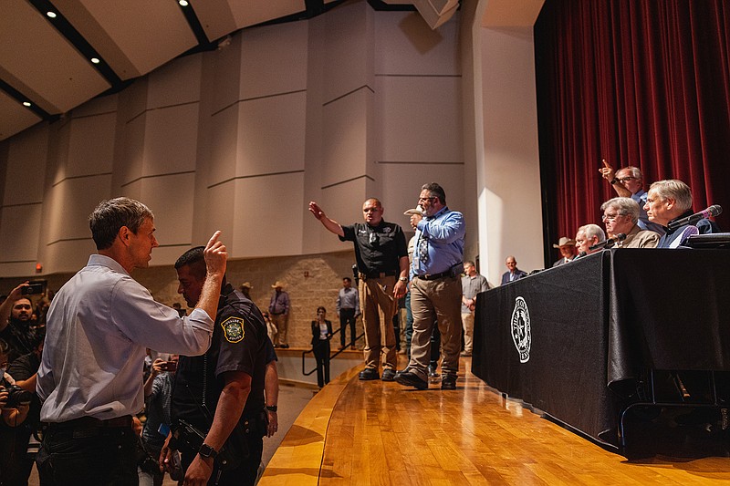 Democratic gubernatorial candidate Beto O'Rourke interrupts a press conference held by Texas Gov. Greg Abbott following a shooting at Robb Elementary School on May 25, 2022, in Uvalde, Texas. (Jordan Vonderhaar/Getty Images/TNS)