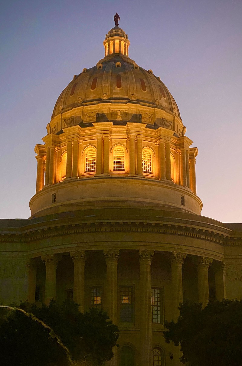 Shaun Zimmerman/News Tribune photo: The Missouri Capitol dome glows orange Monday night, Sept. 26, 2022, for Hunger Action Month.
