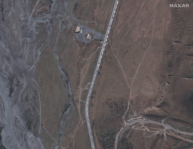 This satellite image provided by Maxar Technologies on Sept. 26, 2022, shows an overview of the traffic jam near the Russia border with Georgia on Sept. 25, 2022 after Russian President Vladamir Putin announced a partial mobilization in Russia. (Satellite image ©2022 Maxar Technologies via AP)