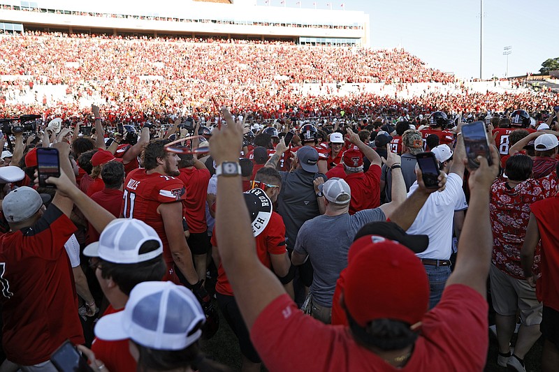 Texas Tech fined for field storming when Texas player shoved Texarkana Gazette
