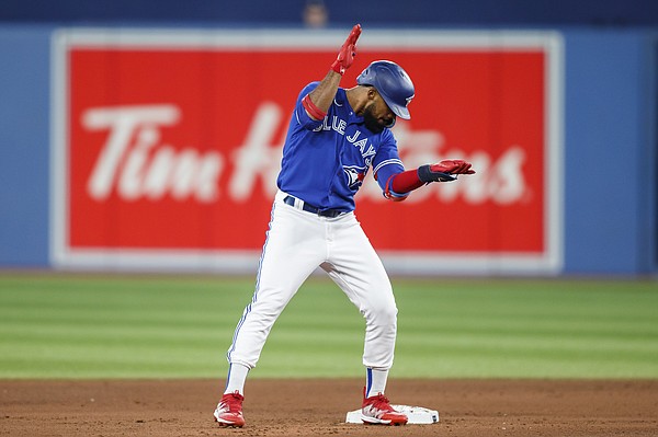 Toronto Blue Jays third baseman Matt Chapman (26) hits a single in the  seventh inning of American League baseball action against the New York  Yankees in Toronto on Saturday, June 18, 2022.