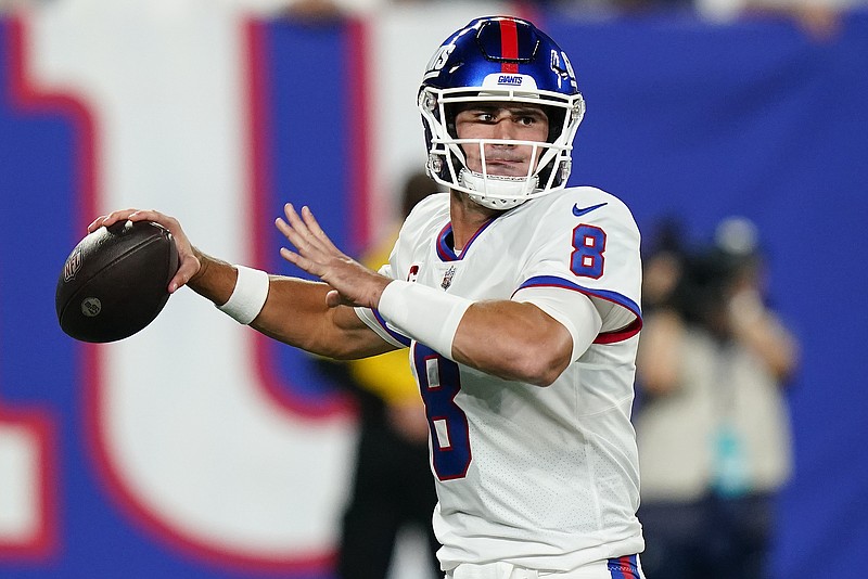 New York Giants quarterback Daniel Jones (8) passes against the Dallas Cowboys during the first quarter of an NFL football game, Monday, Sept. 26, 2022, in East Rutherford, N.J. (AP Photo/Frank Franklin II)