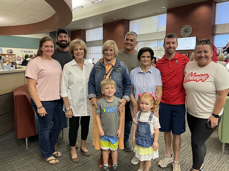 Courtesy of Siloam Springs School District Cheryl Rakestraw, a long-time secretary at Siloam Springs High School, is shown here surrounded by friends and family at her retirement party.