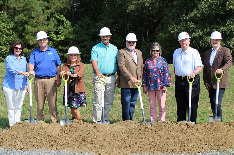 Participants at the Stone Bank ground-breaking ceremony Sept. 14 included Marnie Oldner, Stone Bank chief executive officer (left); David Beck, White Hall alderman; Gladys Rainey-Webb, Stone Bank director; Vince Stone, senior ag loan officer/White Hall market president; Kevin Compton, board chairman, Stone Bank; Sheila Cannon, VP/branch manager, White Hall; Eddie Lumsden, Stone Bank director; and Stephen Ragland, EVP/chief financial officer. (Special to The Commercial)