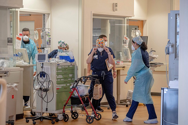 Healthcare workers are seen inside the COVID-19 Intensive Care Unit in North Oaks Hospital in Hammond, Louisiana, on Aug. 13, 2021.   (Emily Kask/AFP/Getty Images/TNS)