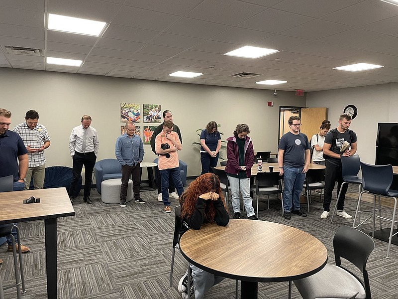 Students, faculty and staff pray for JBU’s new commuter lounge Sept. 22 during a dedication ceremony at the university in Siloam Springs.

(NWA Democrat-Gazette/Spencer Bailey)