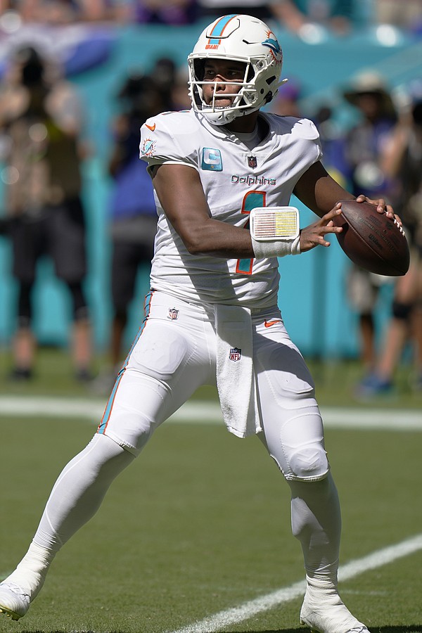 Miami Dolphins quarterback Tua Tagovailoa (1) watches a replay