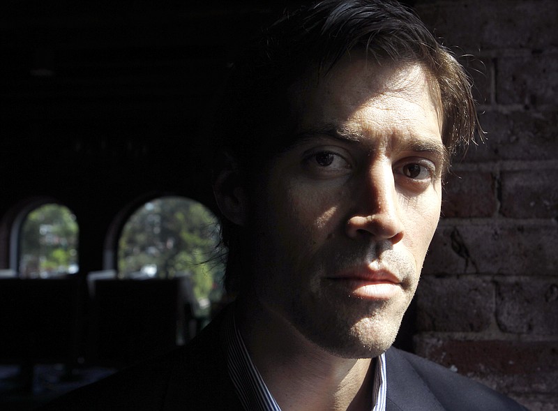 FILE - American Journalist James Foley poses for a photo in Boston on May 27, 2011. Foley, a freelance journalist, was among a group of Westerners murdered in Islamic State captivity in Syria in 2014. (AP Photo/Steven Senne, File)