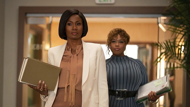 Emayatzy Corinealdi (left) plays Jax and Angela Grovey is her assistant in “Reasonable Doubt,” now streaming on Hulu. (Hulu/TNS/Ser Baffo)