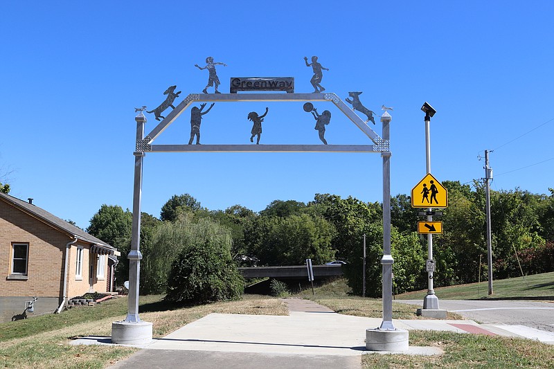 Anna Campbell/News Tribune photo: 
An archway constructed by Nichols Career Center welding students stands above the sidewalk in front of South Elementary School on Linden Drive.