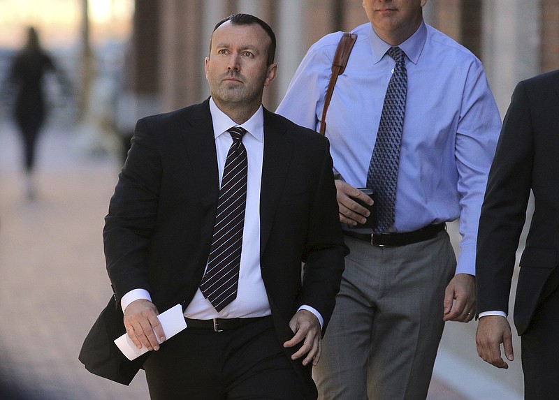 James Baugh, former eBay senior director of safety and security, arrives for his sentencing in a cyber stalking case Thursday, Sept. 29, 2022, at Moakley Federal Court in Boston. Baugh was sentenced to almost five years for leading a scheme to terrorize the creators of an online newsletter that included sending live spiders, cockroaches, a funeral wreath and other disturbing deliveries to their home. (Lane Turner/The Boston Globe via AP)