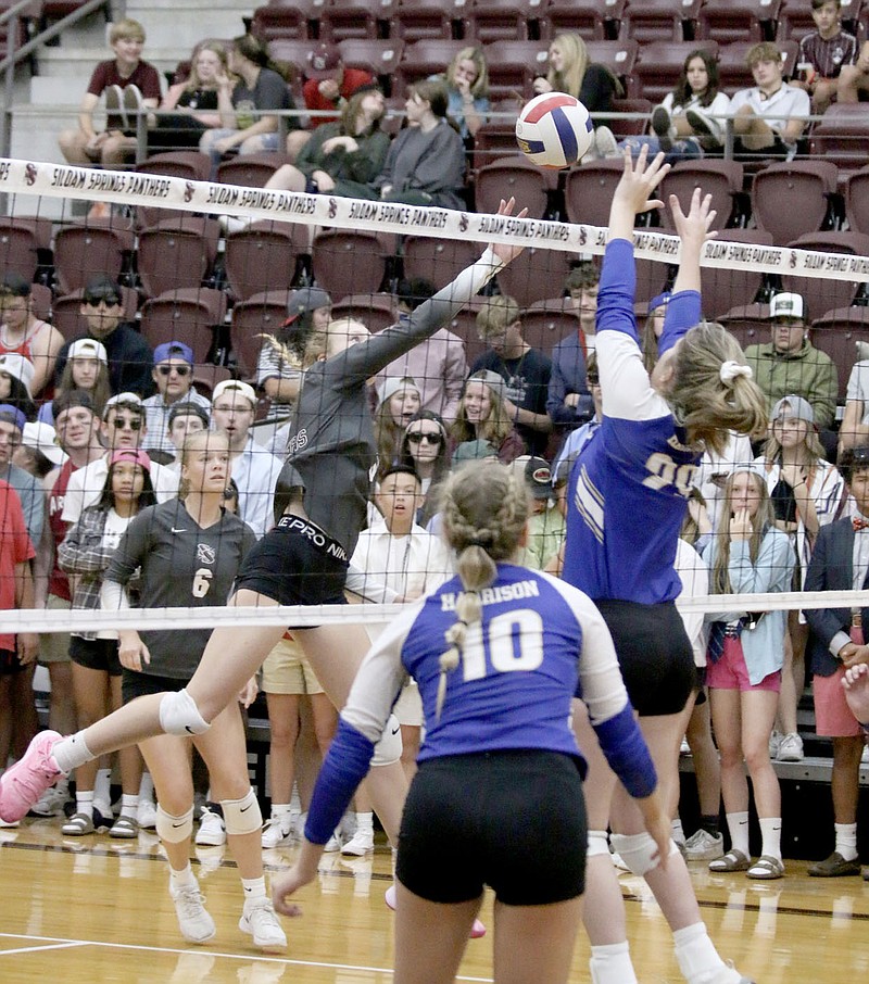Mark Ross/Special to The Herald-Leader
Siloam Springs junior Lillian Wilkie hits the ball over Harrison's Kalli Noell during a 5A-West Conference volleyball match on Tuesday, Sept. 27, inside Panther Activity Center.