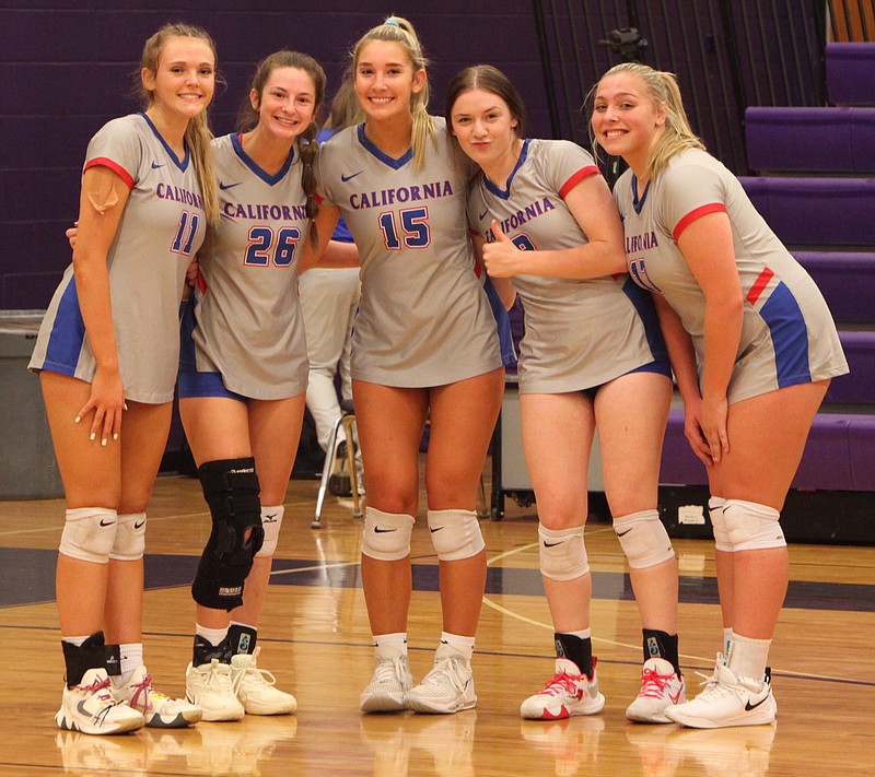 The Lady Pintos get warmed-up to take on the Hickman Kewpies. From left to right: Macie Trimble, Penelope Cotten, Isabella Kincaid, Emma Whitson, Abby Trachsel. (Democrat Photo/Evan Holmes)