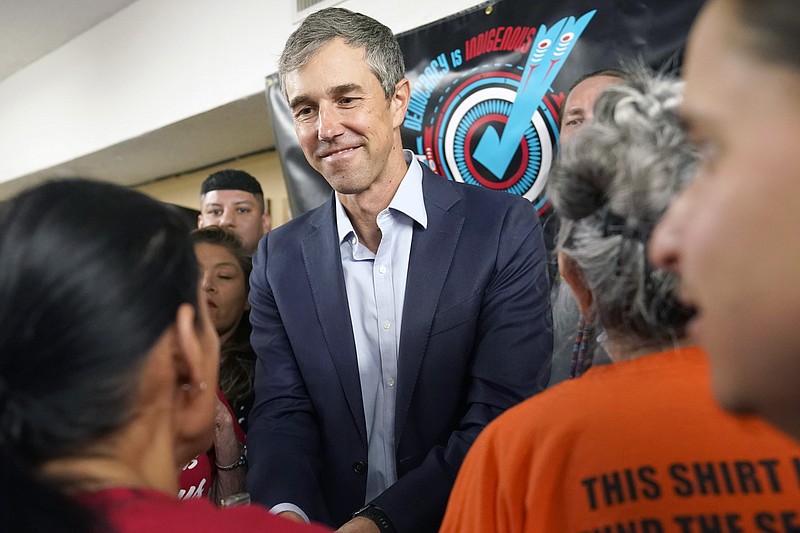 FILE - Texas Democratic gubernatorial candidate Beto O'Rourke shakes hands at a Democracy is Indigenous DFW event in Dallas, Tuesday, Sept. 20, 2022. The former El Paso congressman is scheduled to hold a debate with Republican Gov. Greg Abbott on Friday night. (AP Photo/LM Otero, File)