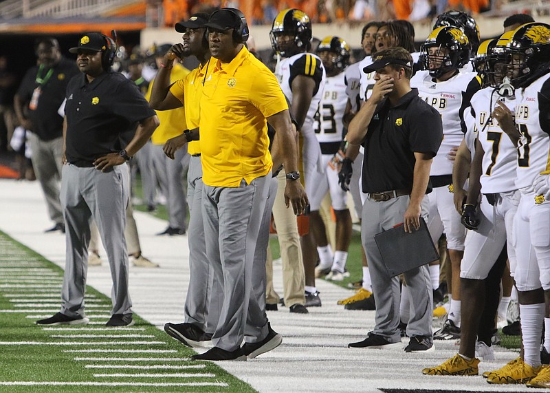 UAPB Coach Doc Gamble, left, watches the action during a Sept. 17 game at Oklahoma State University. (Special to The Commercial/Michael Sudhalter)