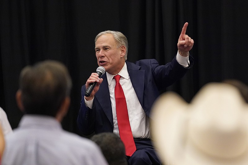 Texas Gov. Greg Abbott addresses supporters after his debate with Texas Democratic gubernatorial candidate Beto O'Rourke on Friday, Sept. 30, 2022, in McAllen, Texas. (AP Photo/Eric Gay)